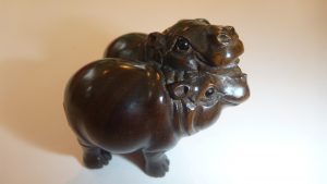 Carved wooden Netsuke - Two Pygmy Hippos