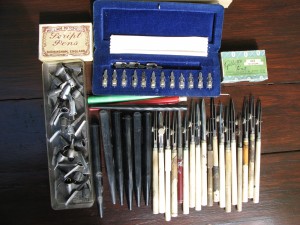 Collection of vintage ink pens and nibs