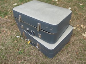 A pair of vinatge Spartan expanding cases. The smaller one fits inside the larger one.