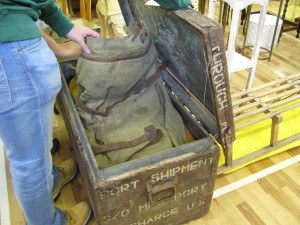 Military chest full of horse tack and saddlery