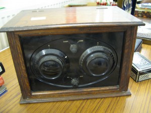 Early valve radio bakelite controls in oak box