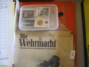 Lot 216 collection of 1930's German Propaganda photos in albums and Large Album 1918-1934 Josetti, loose cards Germany 1930's (many of Hitler) and Die Wehrmacht newspaper 1942. Sold for £50