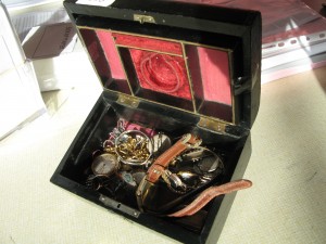 Lot 193 - Musical Jewellery Box with watches, jewellery and a gold chain. Sold for £510