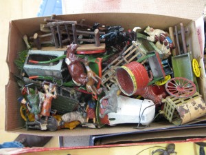 Lot 94 - A box of Britains people, farm animals, buildings - Sold for £40