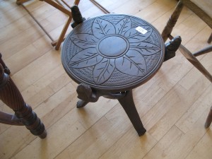 Lot 119 - African carved wooden side table - Sold for £28