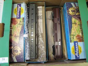 Lot 38 - Box of Athearn trains and carriages - Sold for £35