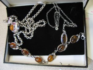 Lot 223 - Silver and Amber bracelets and necklace - Sold for £50