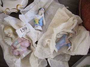 Lot 159 - Three half dolls - Sold for £25