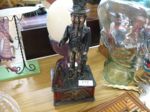 Lot 172 - Cast iron Uncle Sam money box - Sold for £35