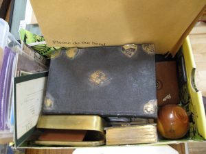 Lot 463 - Mysterious collection of ephemera and objects - Sold for £40