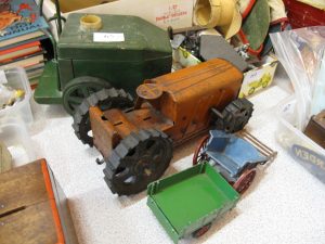 Lot 65 - Triang tractor, carts and another - Sold for £35