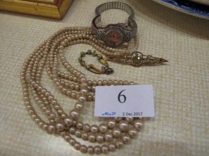 Lot 6 - Pearly necklace and other jewellery - Sold for £30