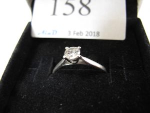 Lot 158 - Clear stone on silver ring - Sold for £35