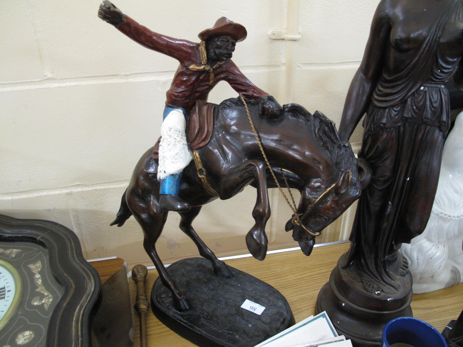 Lot 89 - Bronze of rodeo cowboy on horse - Sold for £40