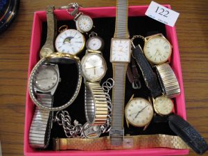 Lot 122 - Box of watches - Sold for £28