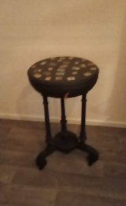 Side table with hinged top