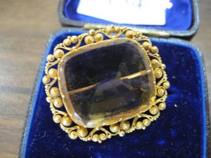 Lot 154 - Citrine gold broach - Sold for £120