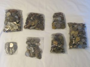 Seven bags of old coins