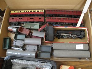Lot 93 - Triang OO Guage loco, trucks and coaches - Sold for £40