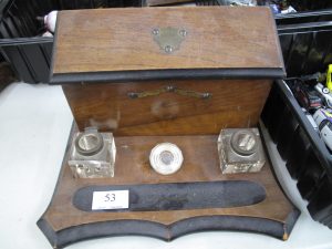 Lot 53 - Edwardian Inkwells in wooden stand - Sold for £25