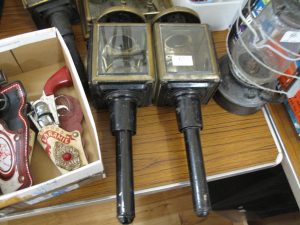 Lot 67 - Pair of stage coach lamps with brass trim to hoods - Sold for £55