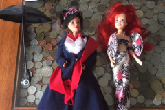 Two barbie dolls