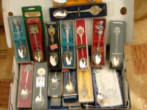Collection of silver plated shield spoons