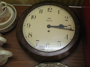 Lot 157 - Wall clock with wooden surround. Sold for £60. 