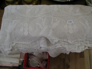 Lot 210 - Large crochet Bedcover. Sold for £ 35.