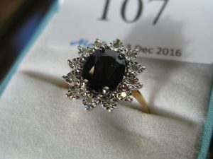 Lot 107 - Diamond and Sapphire Like Ring - Sold for £30
