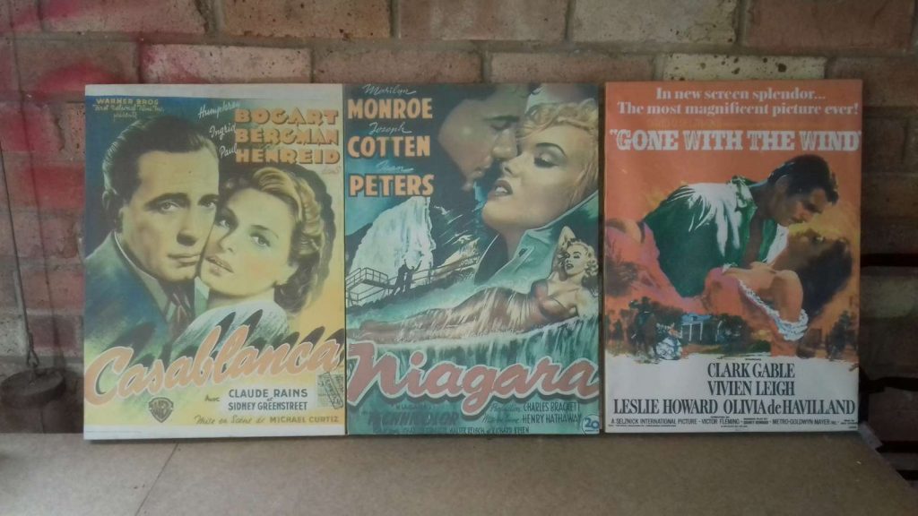 Reproduction posters of Casablanca, Niagara and Gone with the Wind
