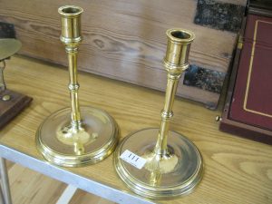 Lot 111 - Pair of antique brass candlesticks with inscribed mitre crest and dated 1862 - Sold for £30