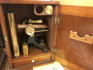 Lot 407 - Vintage brass microscope in case - Sold for £60