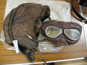 Lot 387 - WWI Flying Helmet and Googles - Sold for £90