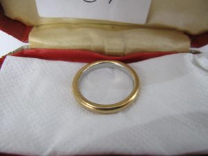 Lot 106t - 22ct platinum and gold wedding band - Sold for £40