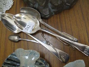 Lot 242 - Silver spoons - Sold for £30
