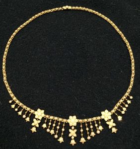 Gold and seeded pearl necklace. Estimate £300-£500