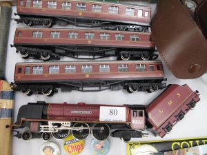 Lot 80 - Hornby OO Gauge Duchess loco and 3 coaches - Sold for £30