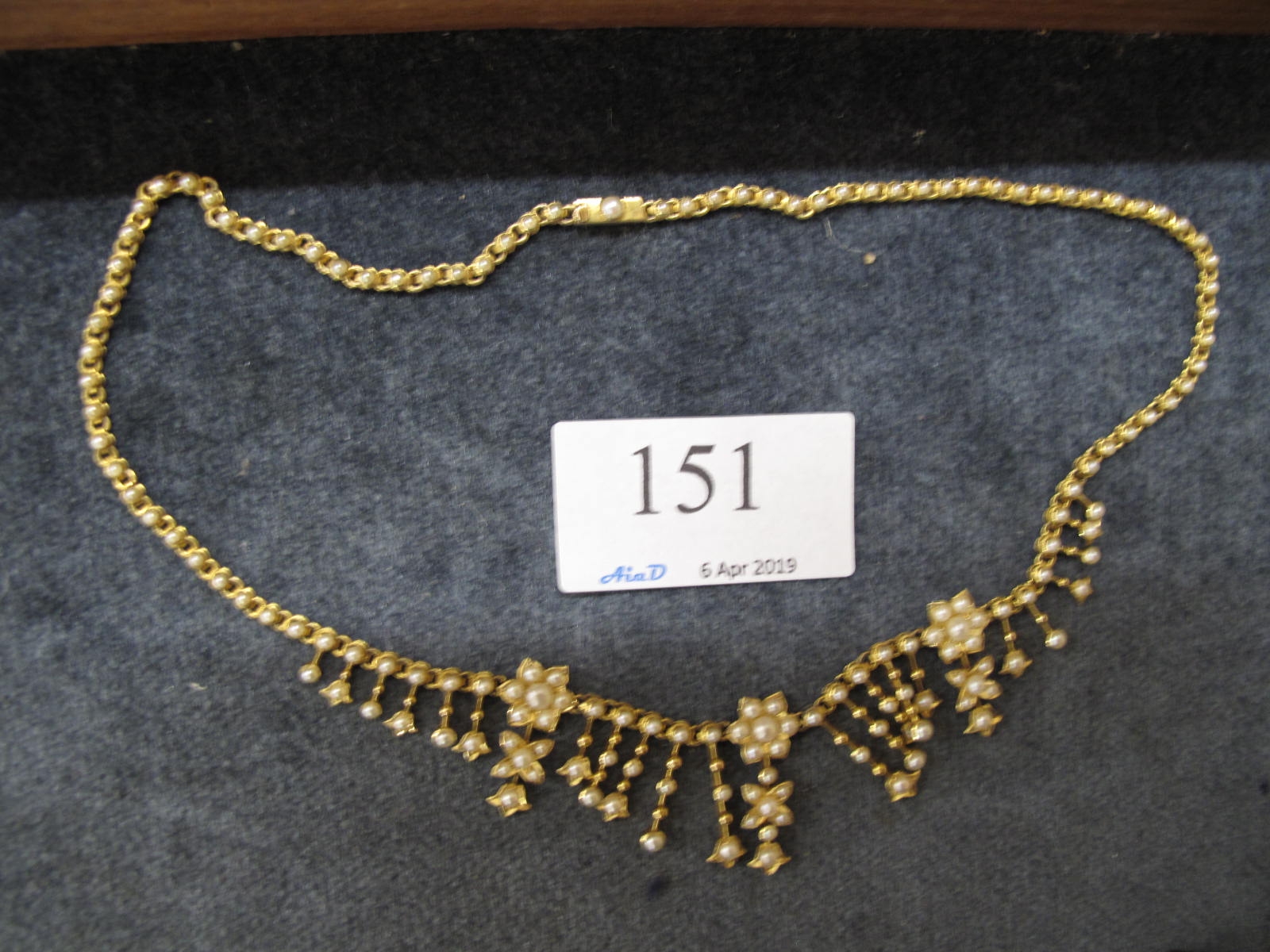 Lot 151 - Gold and seed pearl necklace - Sold for £300