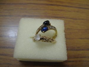 Lot 264 - 2 gold rings with white and blue sapphires - Sold for £40