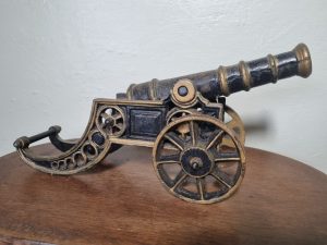 Antique cast iron decorative cannon
