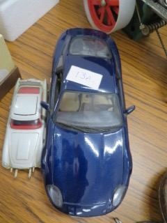 Two Aston Martin model cars sold for £45