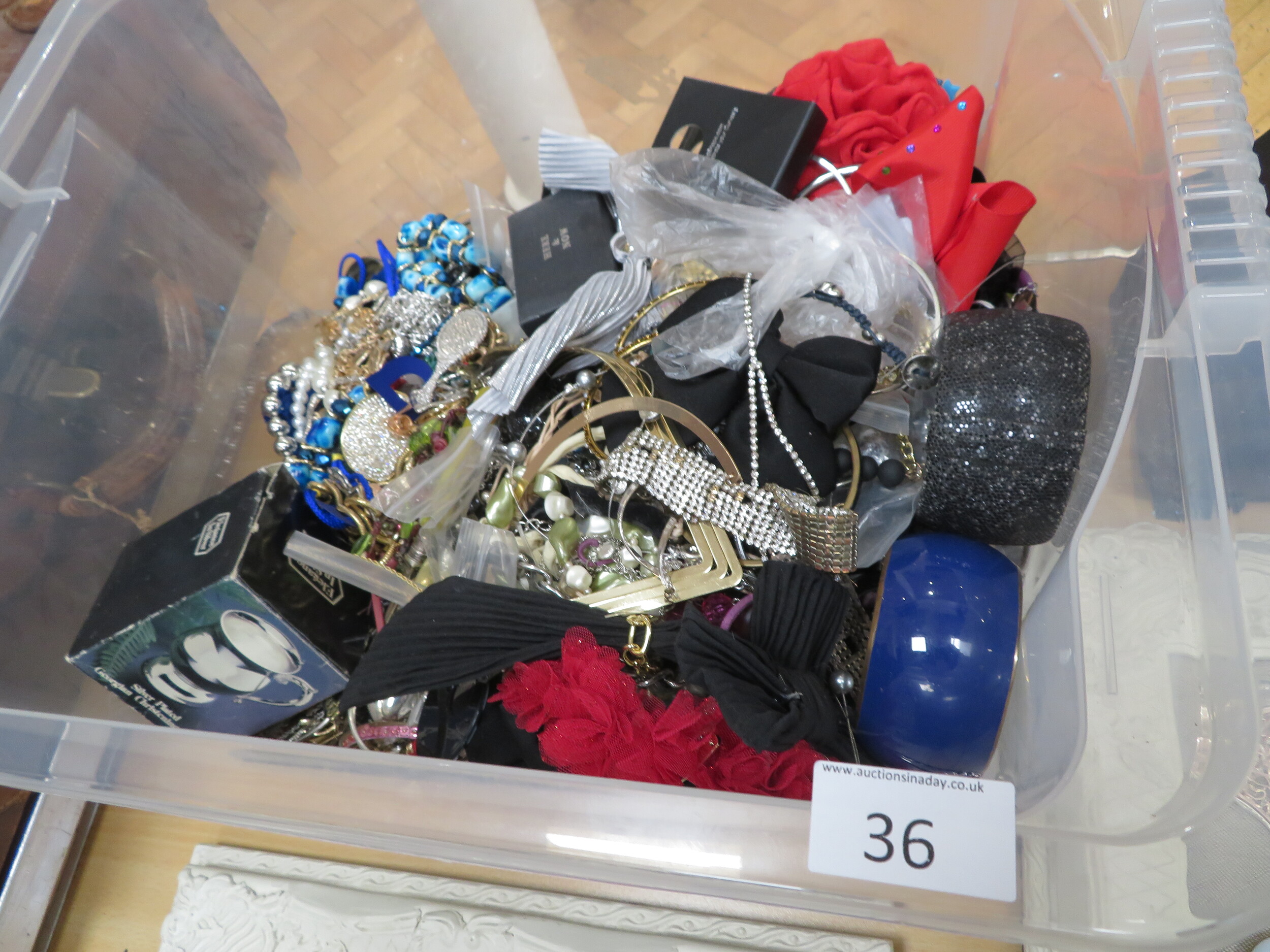 Large box of mixed jewellery sold for £42