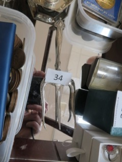 Silver bread fork sold for £45