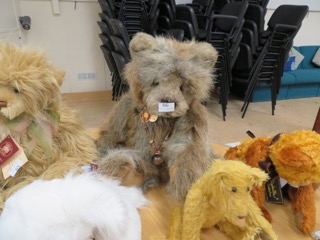 Brown and grey bear sold for £75