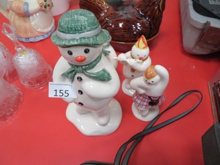 Snowman figures sold for £50